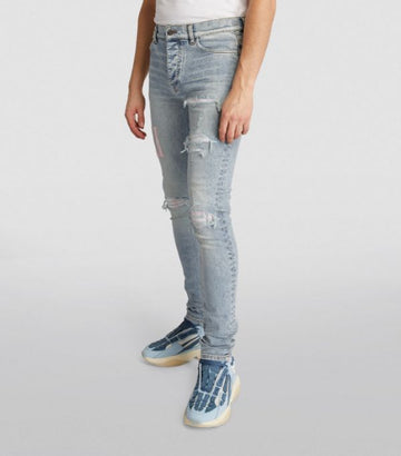 AMIRI Cotton Appliqué Skinny Jeans