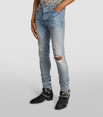 AMIRI Distressed Broken Slim Jeans