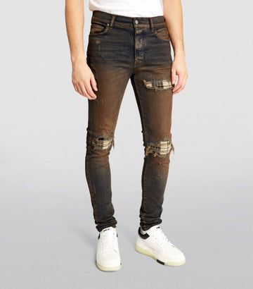 AMIRI Distressed Skinny Capped Jeans